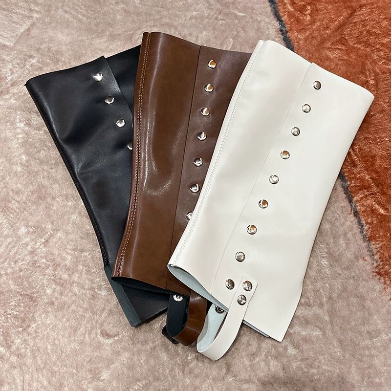 Knee‑high platform boots, European style, chunky sole with stud accents