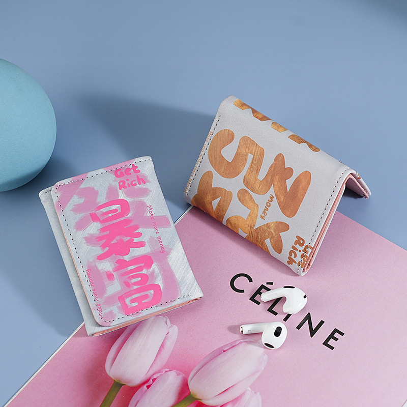 Bolsa de tarjetas de fortuna de Xiaoxian anti-damagnetismo tarjeta de conducir cubierta de tarjeta bancaria nueva bolsa de tarjetas de tres plegables patrón de impresión en stock