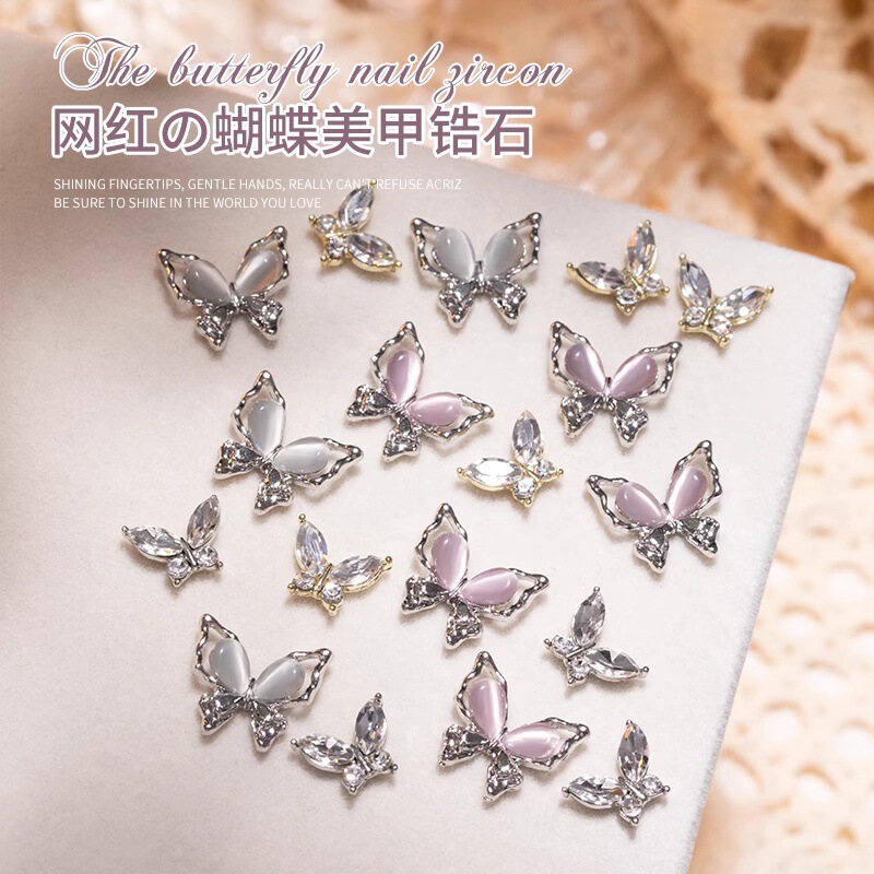 Internet Celebrity Hollow Cat's Eye Butterfly Alloy Nail Art Jewelry Light Luxury Three-Dimensional Nail Drill Cat's Eye Stone Finished Armor Wear