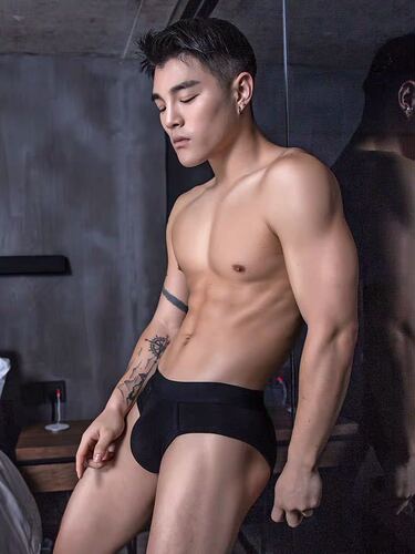 Men's underwear pure cotton men's briefs sexy low waist solid color shorts underwear youth sports comfortable personality