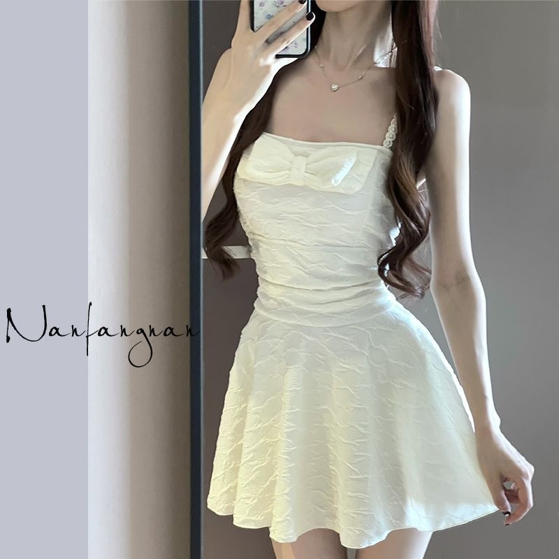 2025 nuevo traje de baño blanco de albaricoque de una pieza para mujer, conservador de alta gama, delgado y lindo, puro deseo de baño de aguas termales al por mayor