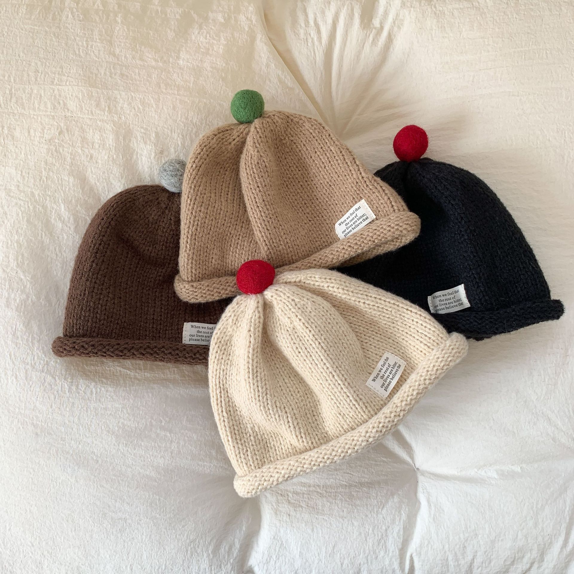 Sombreros de Año Nuevo para niños otoño y invierno niñas sombreros de lana sombreros de punto 2024 nuevos bebés de invierno sombreros de oído calientes