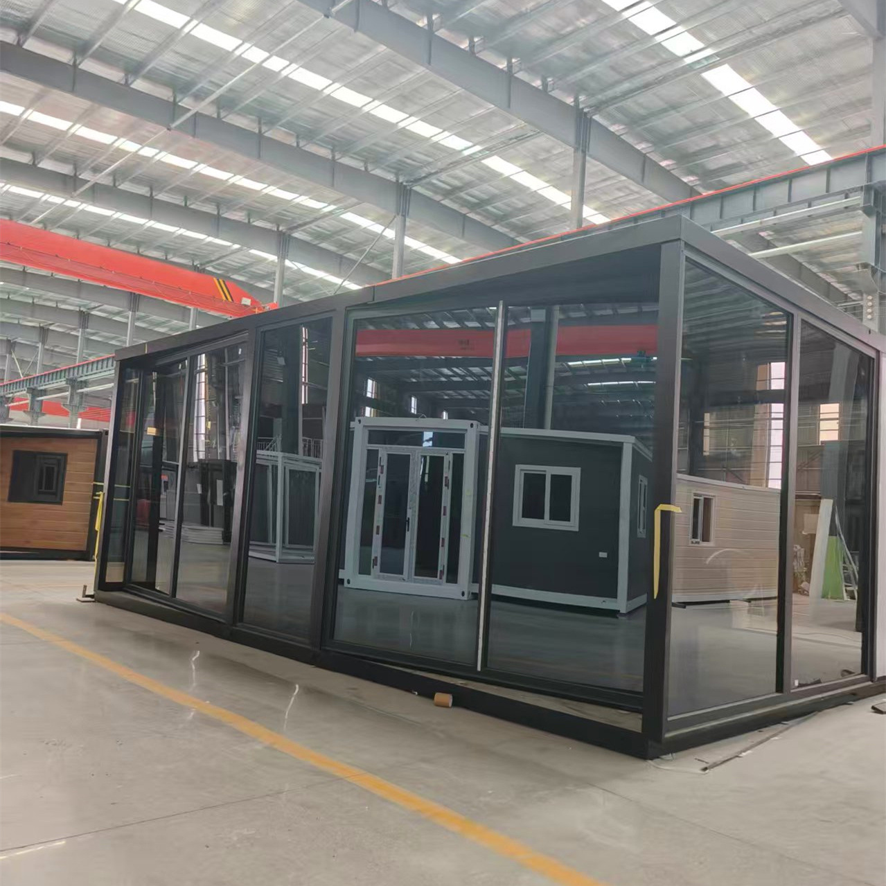 Fábrica al por mayor doble ala expansión plegable temporalmente oficina sitio de construcción puede alojamiento móvil sala integrada rápida