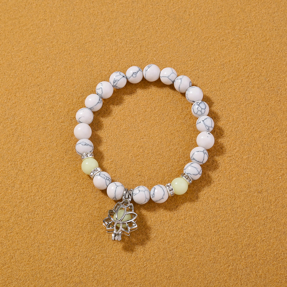 Bracelet de perles lotus phosphorescent brillant dans le noir_voghion.com
