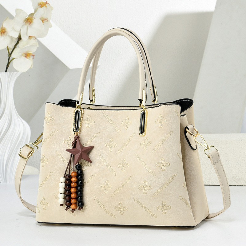 Hermosas estrellas colgantes bolsos de mano diarios ociosos de moda mochilas temperamento versátil bolsos de hombro Handbag