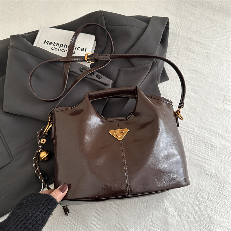 2024 alto valor retrógrado estilo de negocios Meillard bolso de cubo de mano de viaje versátil de invierno nuevo bolso de hombro