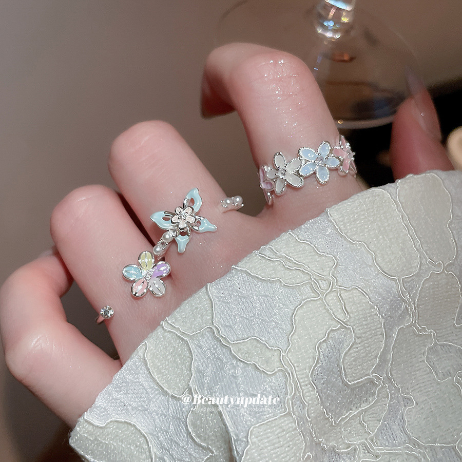 Bague pour index en zircon, perle et goutte d'huile, design ajouré, bijou luxueux et raffiné._voghion.com