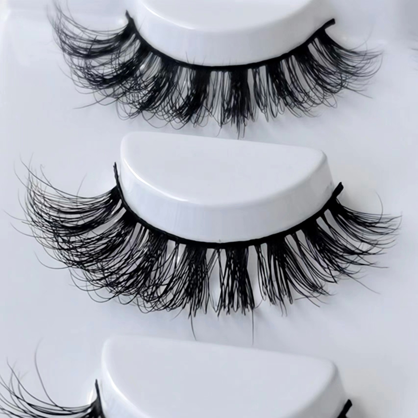 Pestañas postizas de visón para piel pelo grueso de visón europeo y americano desordenado mullido curling 4 pares paquete 3D sangre mixta ojos grandes