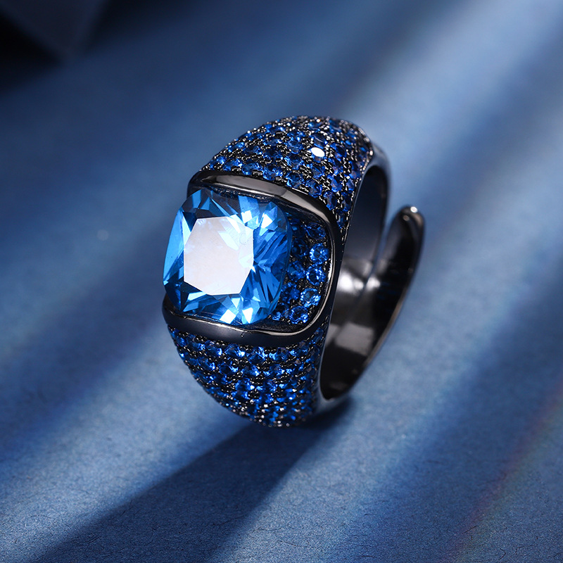 Anillo de cristal puntiagudo azul dorado negro