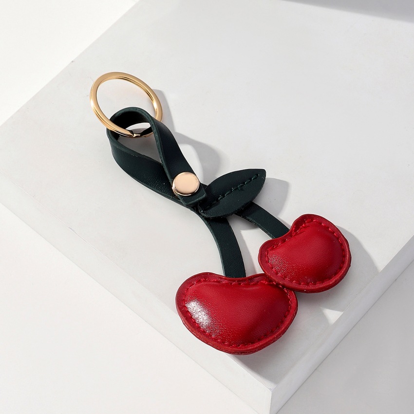 Nuevo estilo pastoral europeo y americano de cuero cereza llavero colgante hombres y mujeres bolsa de coche llavero colgante adornos