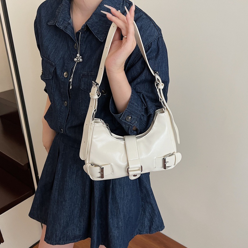 Bolso retro estilo de Hong Kong 2025 verano nuevo bolso femenino de alta calidad textura bolso de hombro moda estilo motocicleta bolso de mensajero