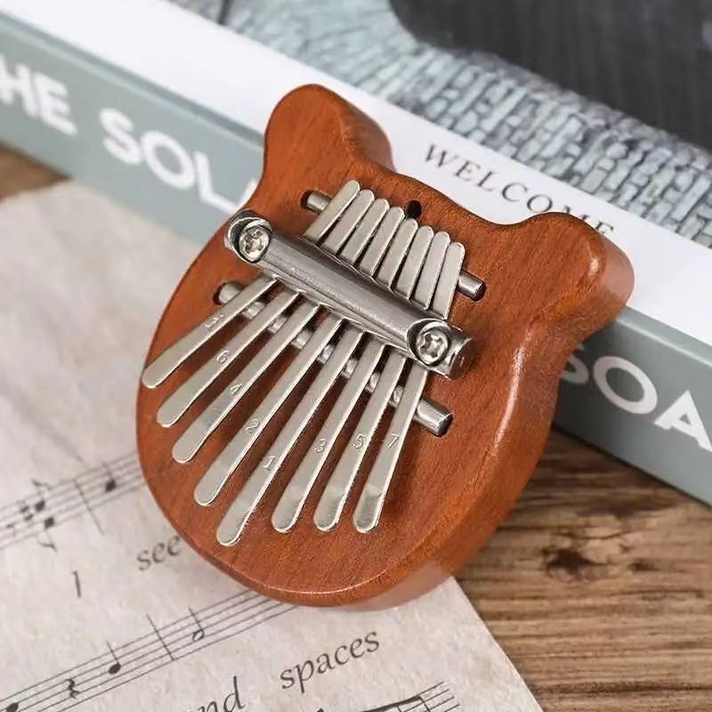 Portable Finger Piano 8-Tone Kalimba Thumb Piano Mini Five-Finger Piano Niche Musical Instrument Kidsren's Educational Toys Wholesale Portable Finger Piano 8-Tone Kalimba Thumb Piano Mini Five-Finger Piano Niche Musical Instrument Kidsren's Educational Toys Wholesale