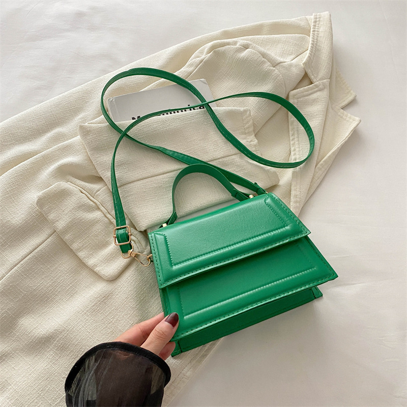 Calle casualidad de color sólido bolso de hombro 2024 nuevo tipo de bolso de mano casualidad nueva moda simple bolso de hombro