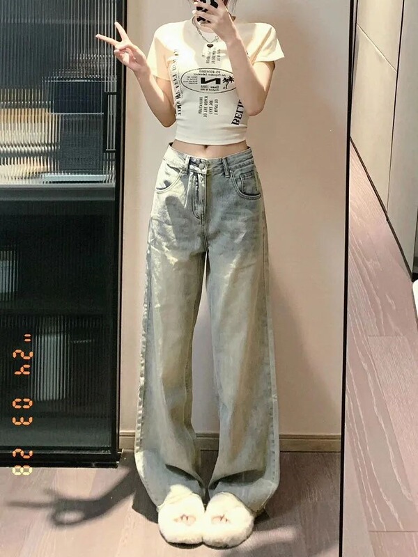 2026 Spring New High-Waisted Slimming Versatile Blue Flared Jeans with Frayed Hem Design for Women