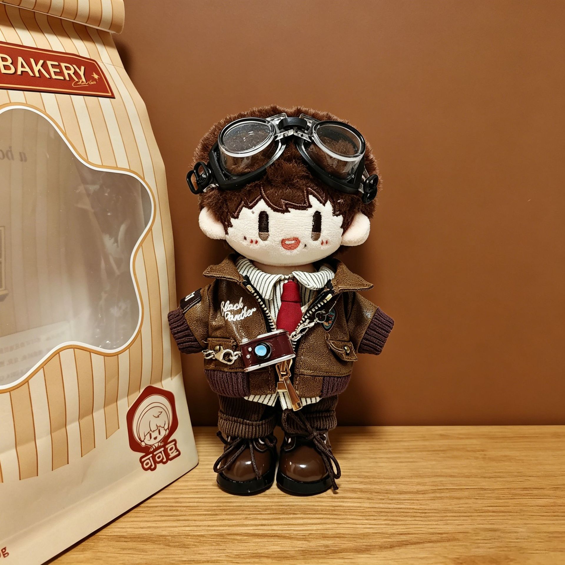 Leather jacket + British shirt + brown pants + camera + goggles + brown leather …