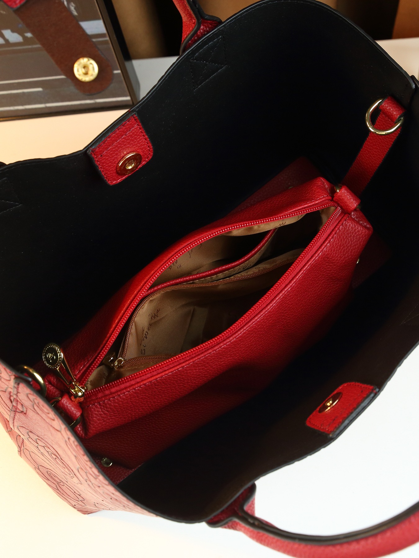 Borsa a secchiello a tracolla con stampa floreale elegante_voghion.com