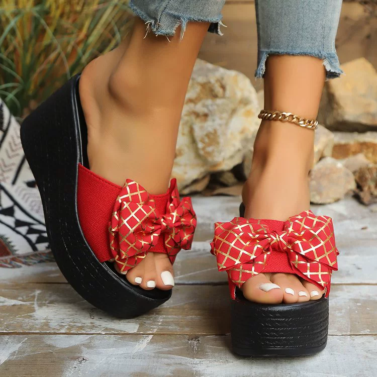 Летние платформенные шлепанцы для женщин оптом для внешней торговли 2025 новые европейские и американские шлепанцы на клиньях с бантом