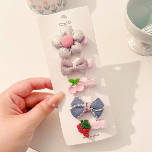 Hermosos clips de cabello de color para niños coreanos de alto nivel sensación de arco de niñas bolsa de tela no daña clips de cabello de bebé
