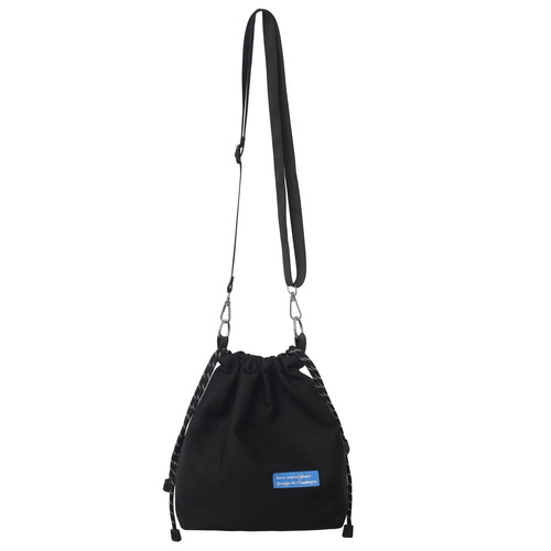 布袋包新款女士单肩斜跨包ins潮流抽绳包男女水桶包情侣小包