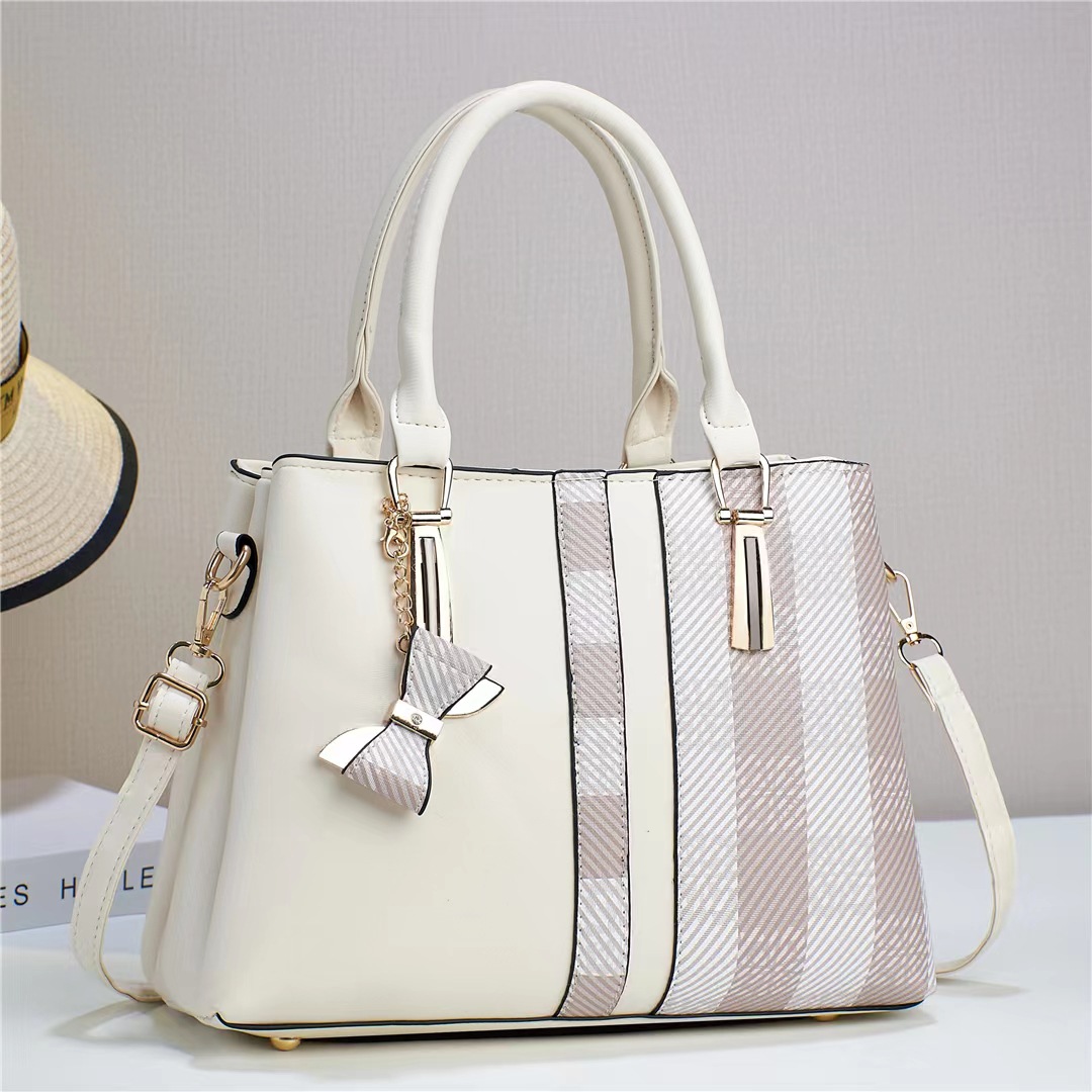 Bolsa de mano coreana de textura de hombro de una sola mano, bolso de moda de mujeres, bolso de comercio exterior, bolso de mujer 2025 nuevo