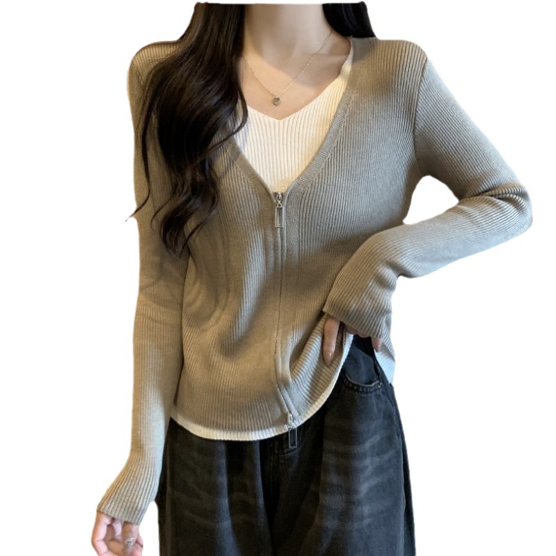 2023 Primavera y Otoño nuevo falso de dos piezas con cuello en V de manga larga de punto exterior de punto superior de las mujeres de la cremallera de moda suéter fino image 7