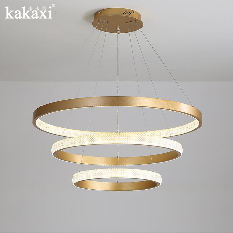 Modern minimalist luxury bedroom, timeless design, interior and exterior illuminated circular chandelier, Nordic LED acrylic water-filled lamp.