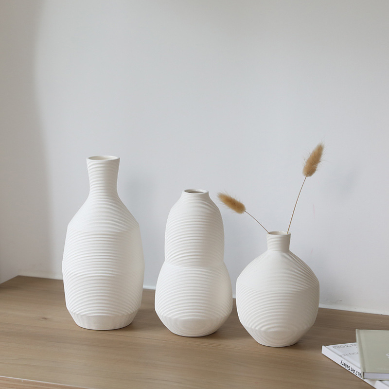 Estilo nórdico personalizado arte flor dispositivo ins simple jarrón de cerámica blanca decoración pasillo flor seca arreglo Decoración