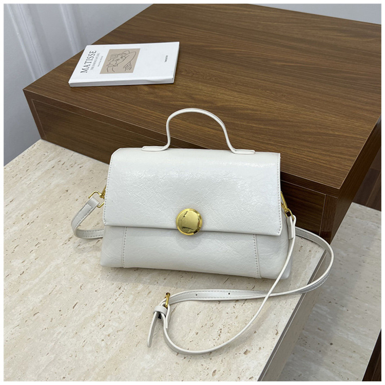 Bolso de mano de alta sensación para mujeres 2026 verano nuevo nicho de lujo ligero bolso cuadrado retrógrado ocio mochila de hombro
