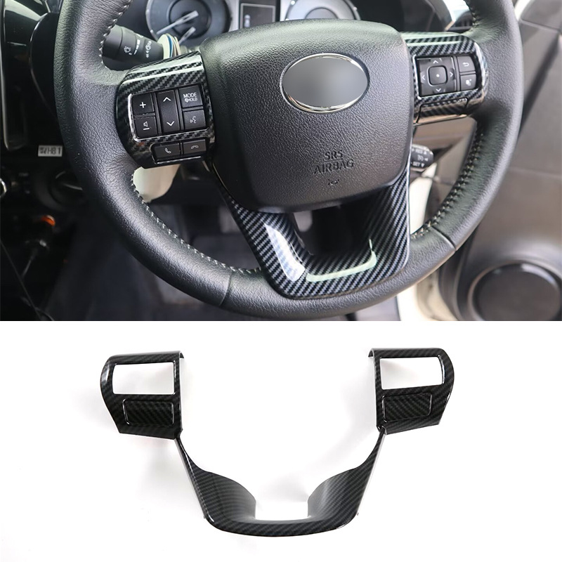 Suitable for Toyota 24 Hilux steering wheel panel decorative frame button protection interior modification