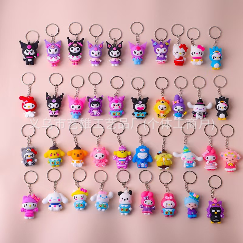 Nuevo estilo de dibujos animados de PVC huevo llavero de fiesta muñeca pequeña decoración creativa pegamento suave adorable colgante al por mayor