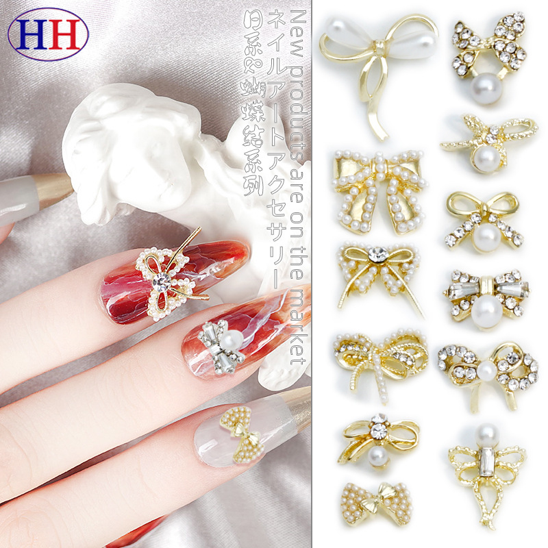 LZ nuevo rojo neto mismo estilo de uñas arco Aleación de uñas joyería arco de uñas de perlas de diamantes fábrica al por mayor