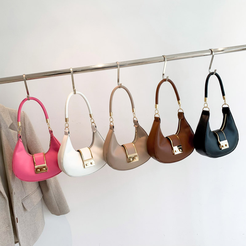 Bolso de hombro de cercanías simple bolso de las axilas retro de las mujeres 2023 nicho de otoño nuevo bolso de mensajero del color del caramelo bolsas