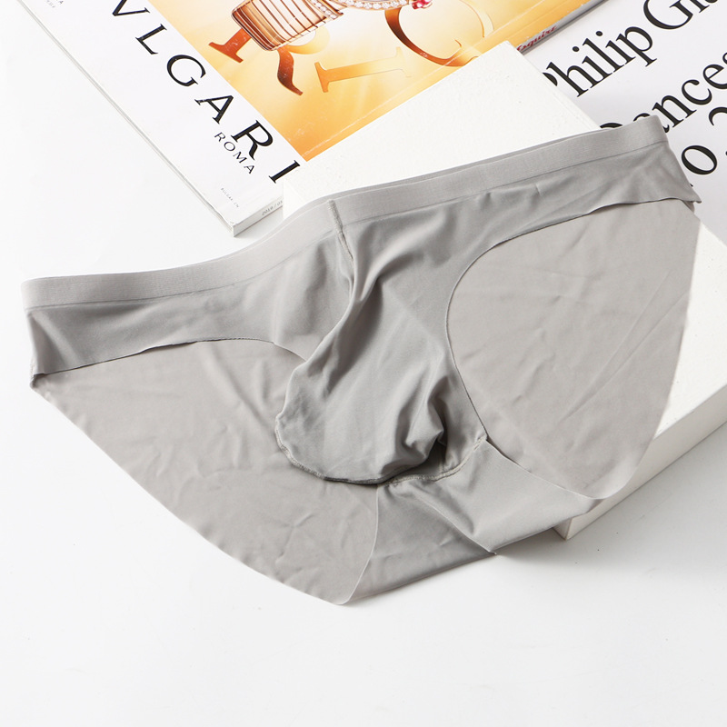 Primavera y verano nueva ropa interior sin costuras de seda de hielo calzoncillos para hombres pistola convexa separación de huevos secado rápido moda juvenil pantalones cortos de color sólido