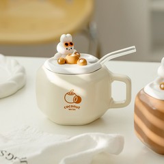 A high-quality and attractive cup with a lid, featuring a cute cartoon rabbit design, perfect as a creative and adorable promotional gift for social media influencers.