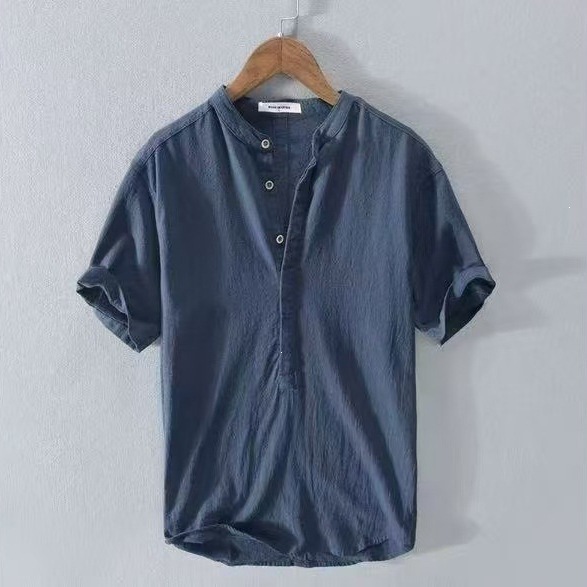 Camicia da uomo taglie forti in cotone e lino a maniche corte, vestibilità ampia e casual, ideale per l'estate._voghion.com