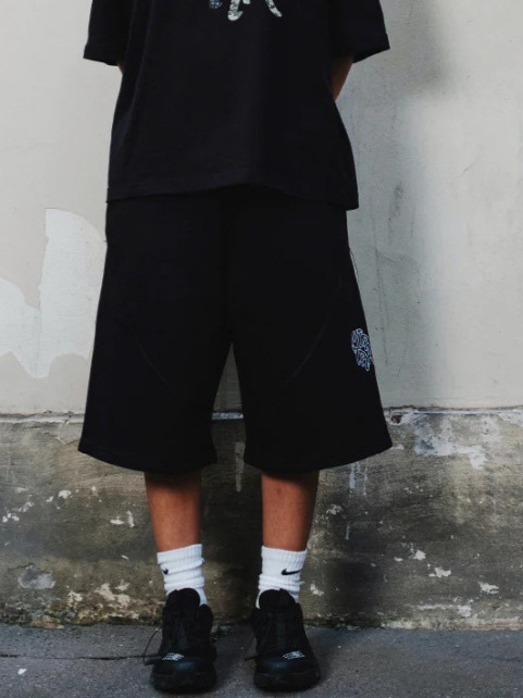 Europeos y estadounidenses bordados transfronterizos pantalones de cinco puntos, pantalones casuales para hombres y mujeres, pantalones cortos de moda relajados hip-hop retro americanos