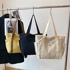 大容量トートキャンバスバッグ通勤高颜値通勤百合文芸学生装本シングルショルダーバッグ
