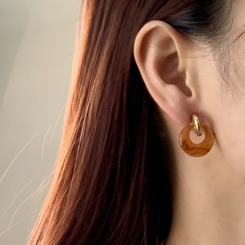 Universal ear clip earrings, painless no‑pierce design, simple elegant mosquito‑coil style