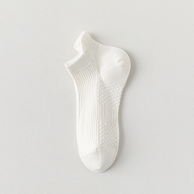 Calcetines de barco para mujeres, calcetines de primavera y verano, calcetines de algodón de color sólido, calcetines de algodón resistentes a las bolas, calcetines de embalaje independientes sin costuras.