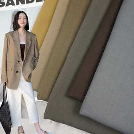 新品春秋西装套装制服面料 涤纶梭织纯色弹力布 马甲裤装时装布料