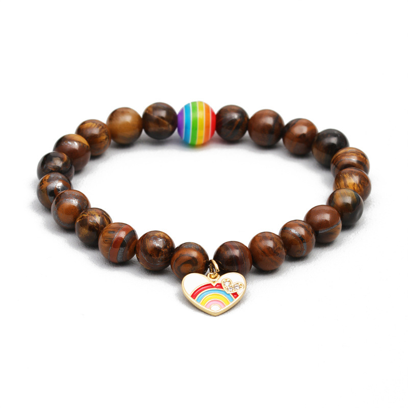 Cuentas coloridas europeas y americanas transfronterizas Ojo de tigre Pulsera de cuentas de piedra volcánica pulsera de arco iris de piedra hombres y mujeres pulsera de pareja