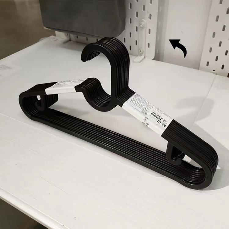 Colgante de ropa para el hogar colgante de ropa espesa y gruesa sin huellas anti-hombro esquinas colgantes de ropa de plástico blanco y negro colgantes de ropa colgantes de ropa dormitorio