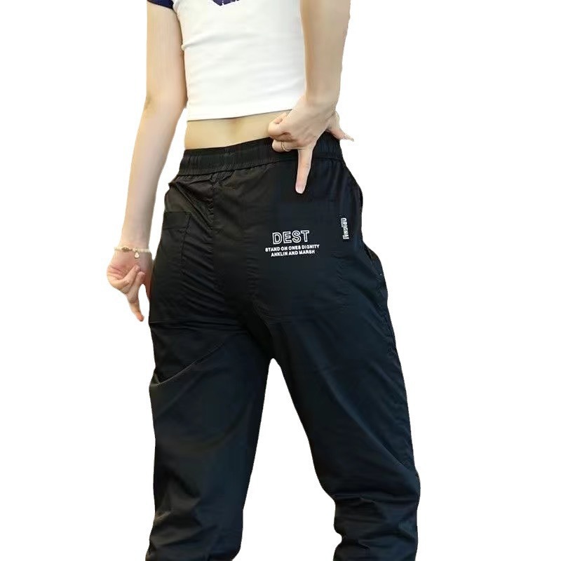 Hombres coreanos cómodos pantalones transpirables de verano delgados pantalones casuales de seda de hielo sueltos pantalones deportivos de tendencia fuente al por mayor