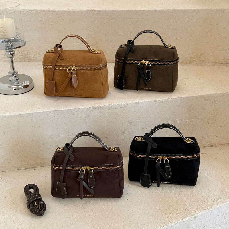 Korean-style niche light-luxury vintage suede handbag 2026 autumn new commuter shoulder and crossbody bag