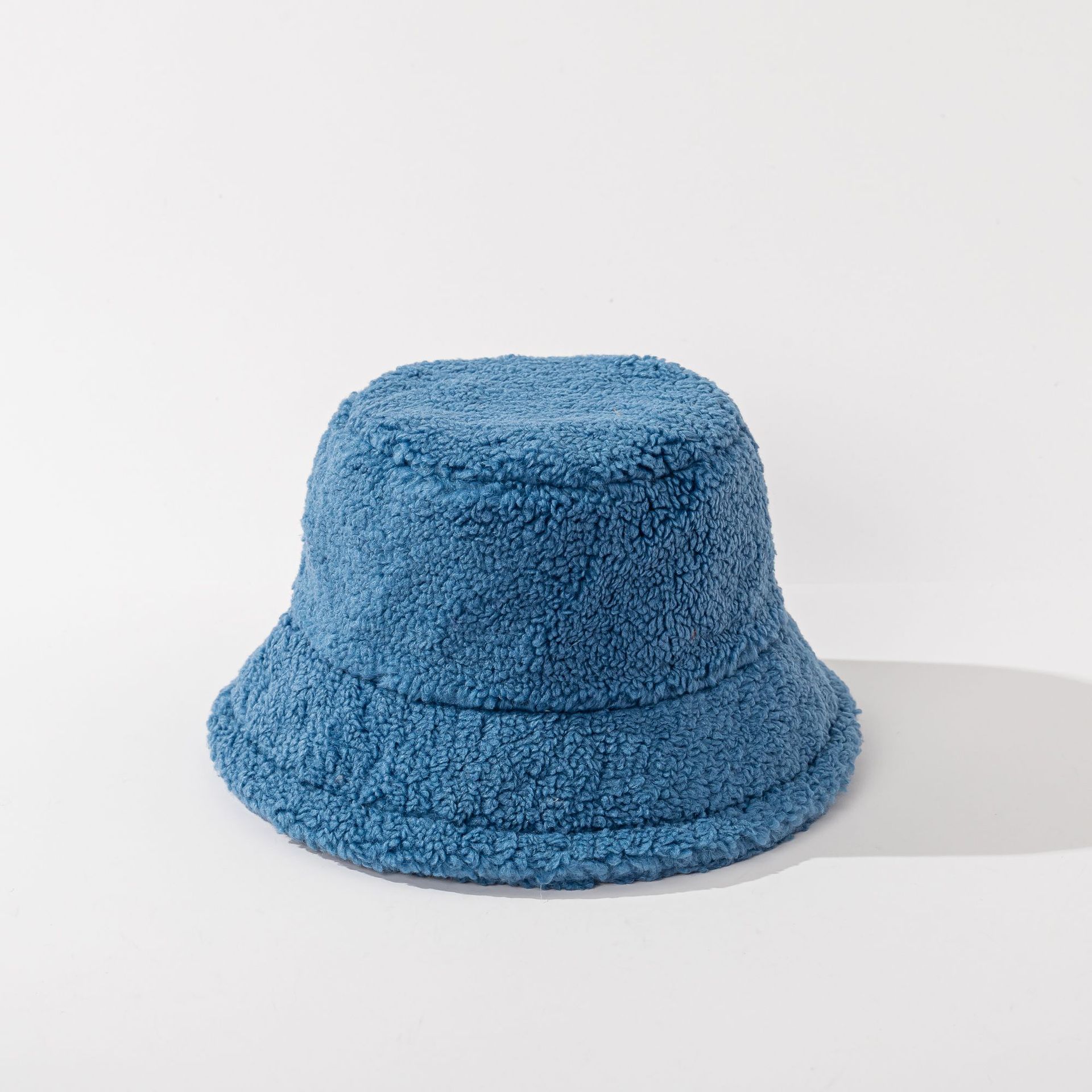 Sombrero de pescador de lana de cordero de color sólido para hombres y mujeres otoño e invierno nuevo cálido sombrero de cuenca engrosada gran circunferencia de la cabeza sombrero simple de todo fósforo