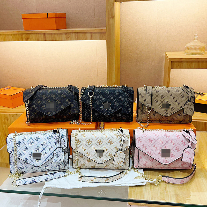 Bolsos transfronterizos 2024 nuevo bolso cuadrado pequeño rombo de sentido avanzado de la tendencia Bolso bandolera con letras impresas de moda de estilo europeo y americano