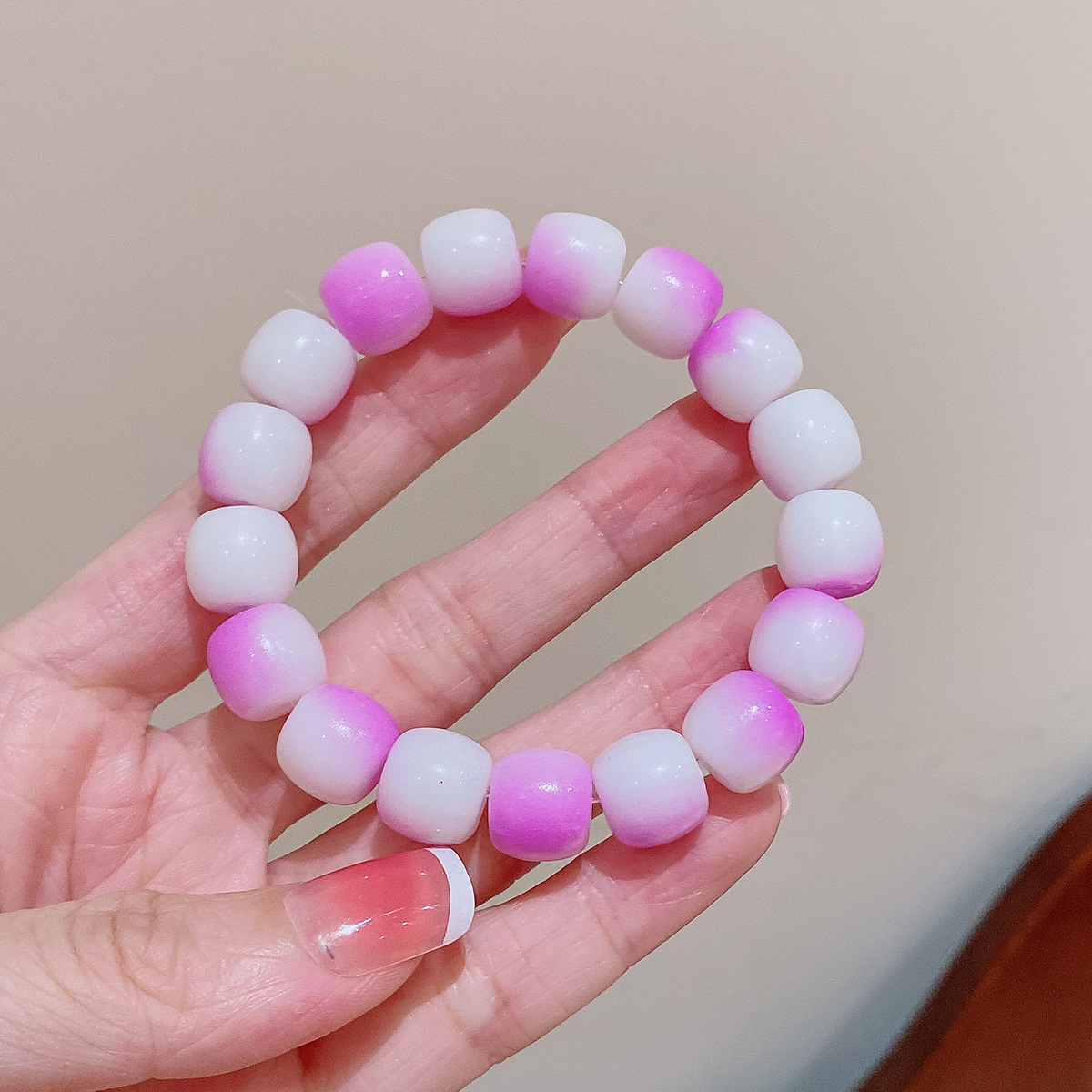 Tiktok mismo gradiente de color placa jugando pulsera estudiante partido dedo bobinado suave descompresión pulsera de cuentas Yiwu pequeña joyería al por mayor