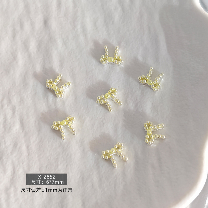 春日甜美简约日韩风珍珠蝴蝶结立体树脂美甲饰品爆款多色系指甲钻|undefined