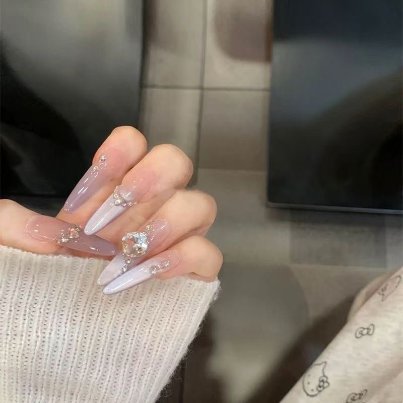 Armor portátil hecho a mano 2025 nuevo producto de alta calidad industria pesada púrpura ojo de gato fino uñas de uñas de perro terminado hecho a mano