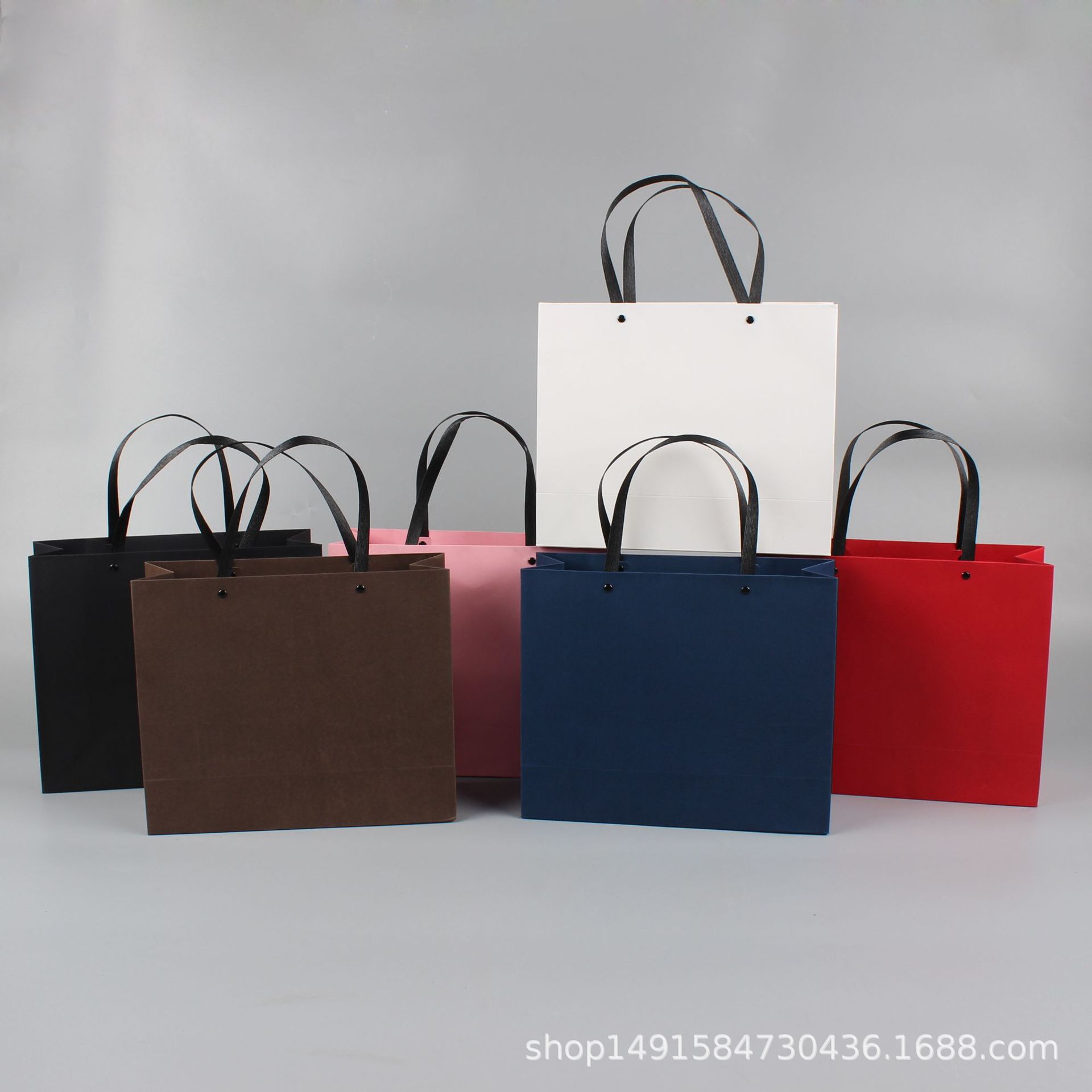 厂家批发牛皮纸袋供应现货手提礼品购物服装白卡手提纸袋加印logo